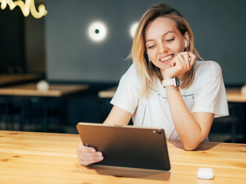 stylish-millennial-woman-working-on-tablet-in-coworking-space-1-1.jpg